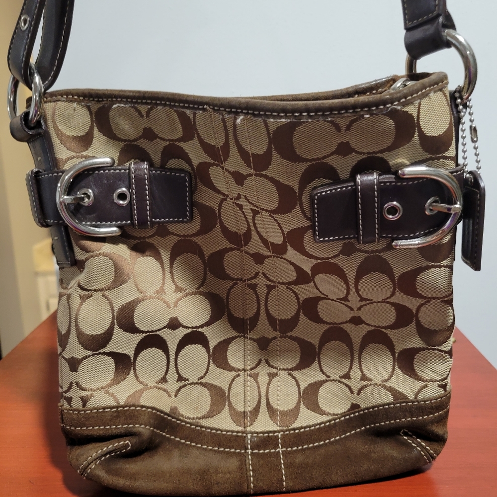 Coach purse with duster bag